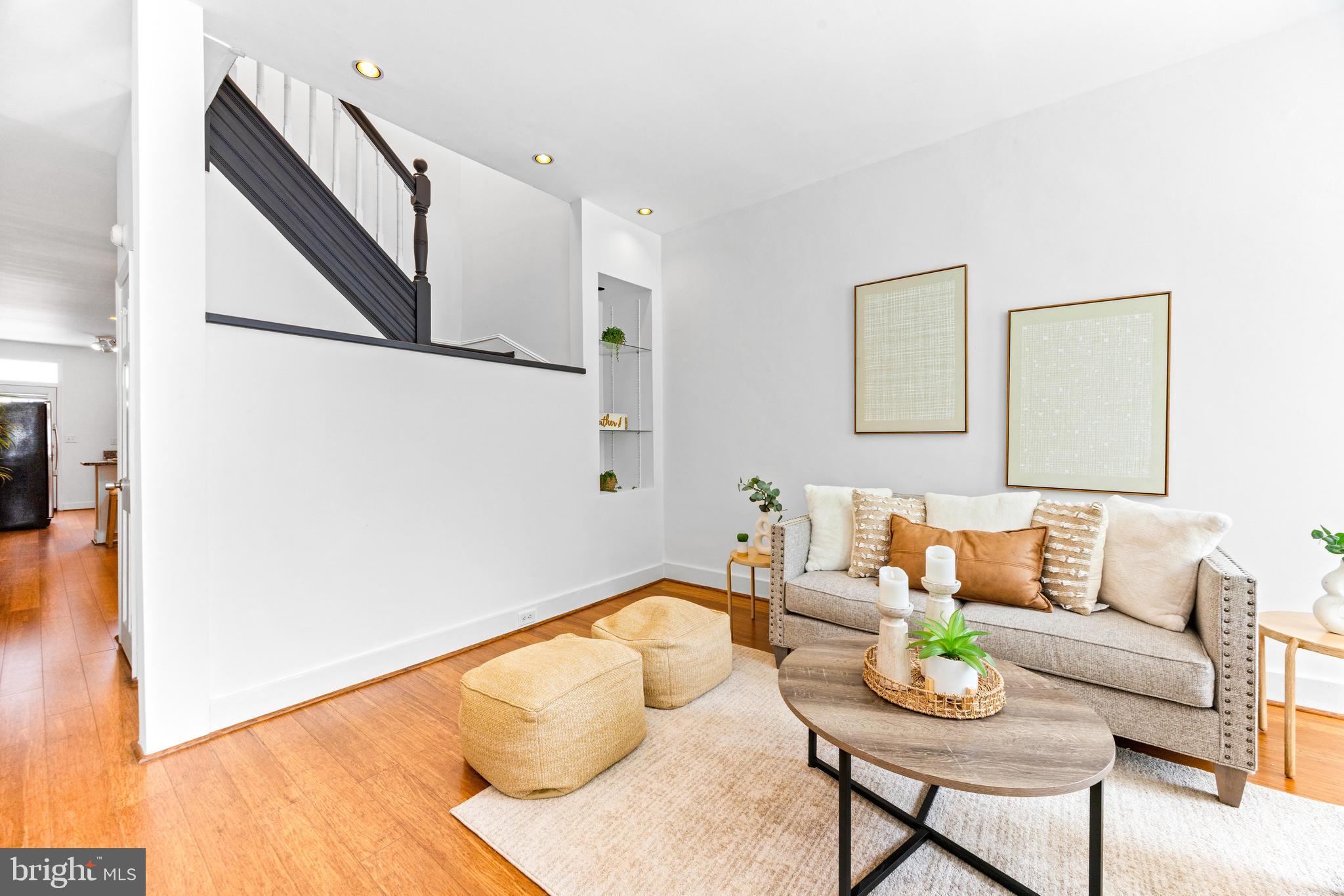 3353 Beech Avenue Baltimore, MD 21211 - Photo 5 of 32 a living room with furniture and wooden floor