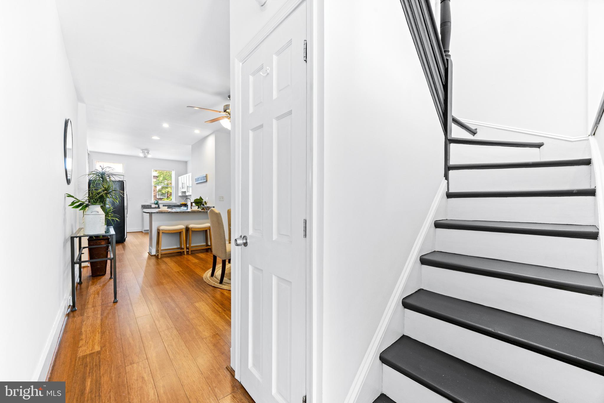3353 Beech Avenue Baltimore, MD 21211 - Photo 6 of 32 a view of entryway and hall with wooden floor