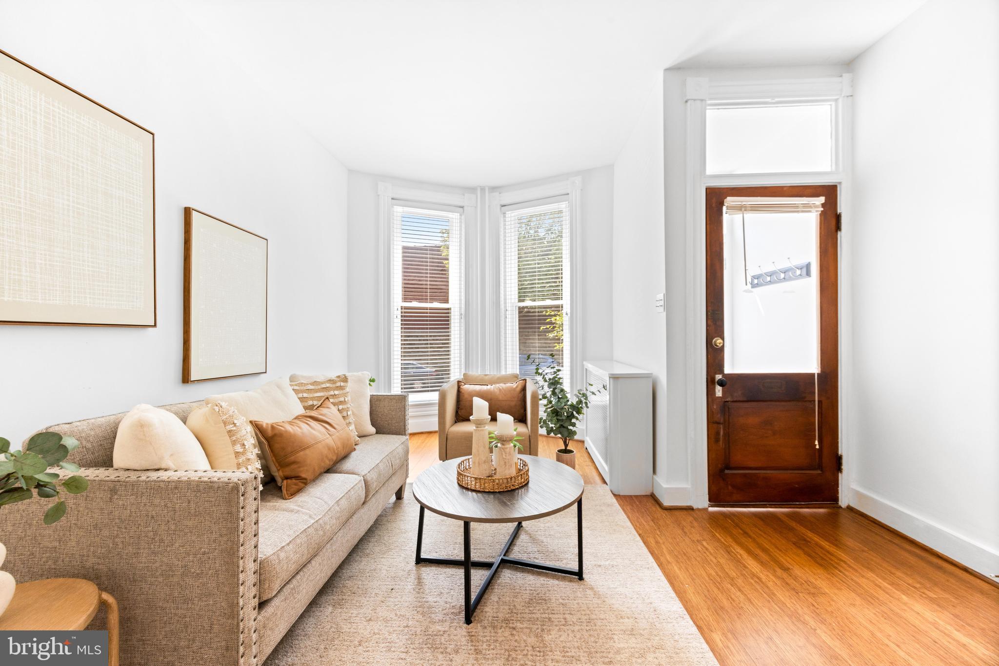 3353 Beech Avenue Baltimore, MD 21211 - Photo 7 of 32 a living room with furniture and a window
