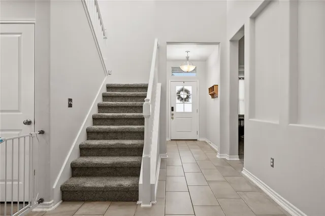 a view of an entryway with staircase