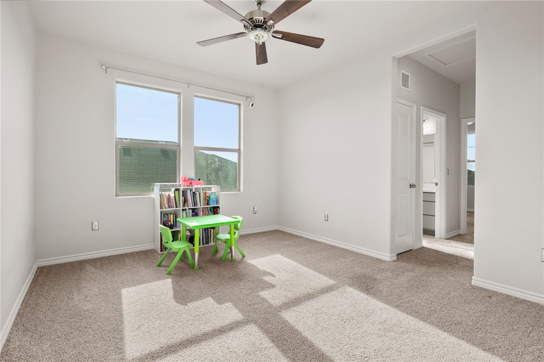 1031 Ocean Breeze Portland, TX 78374 - Photo 22 of 35 a living room with a table and chairs
