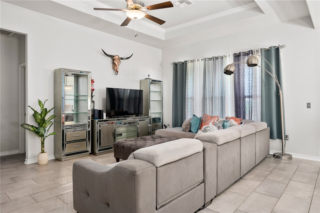 1031 Ocean Breeze Portland, TX 78374 - Photo 6 of 35 a living room with furniture and a flat screen tv