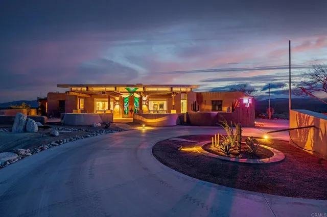a living room with fireplace furniture and a flat screen tv