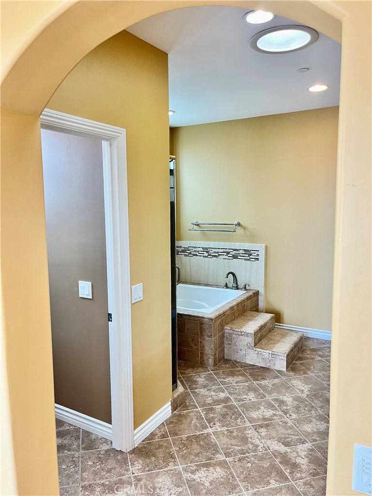 244 Avenida Granada, Unit B San Clemente, CA 92672 - Photo 14 of 19 a bathroom with a tub