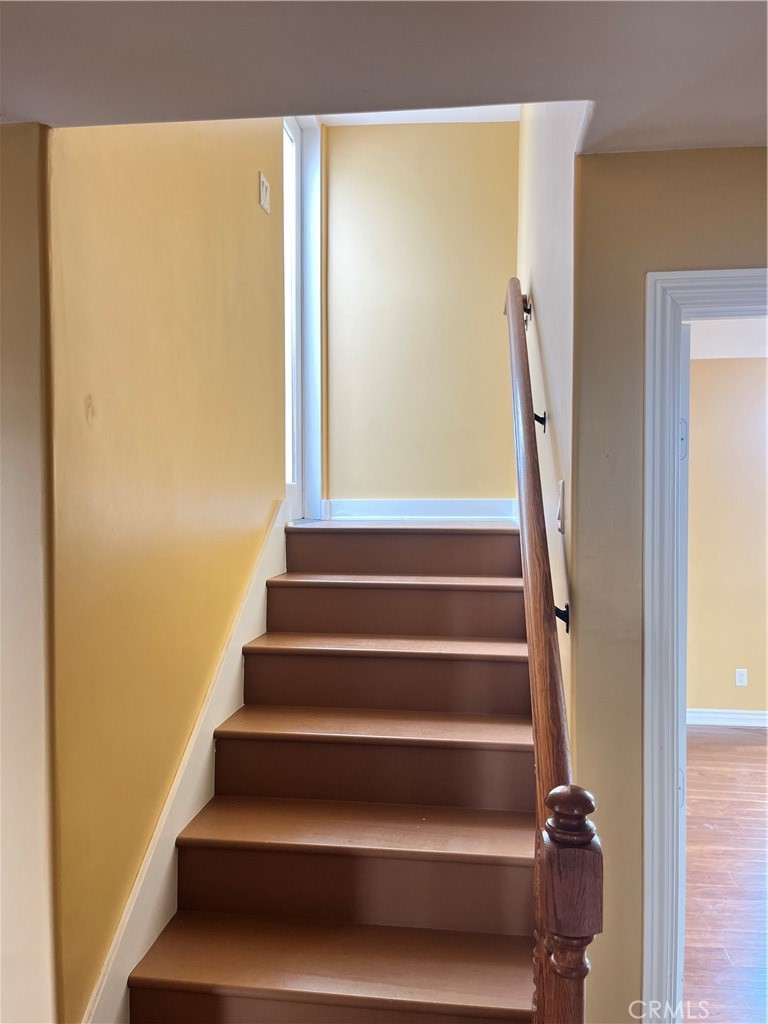 244 Avenida Granada, Unit B San Clemente, CA 92672 - Photo 17 of 19 a view of entryway with wooden floor