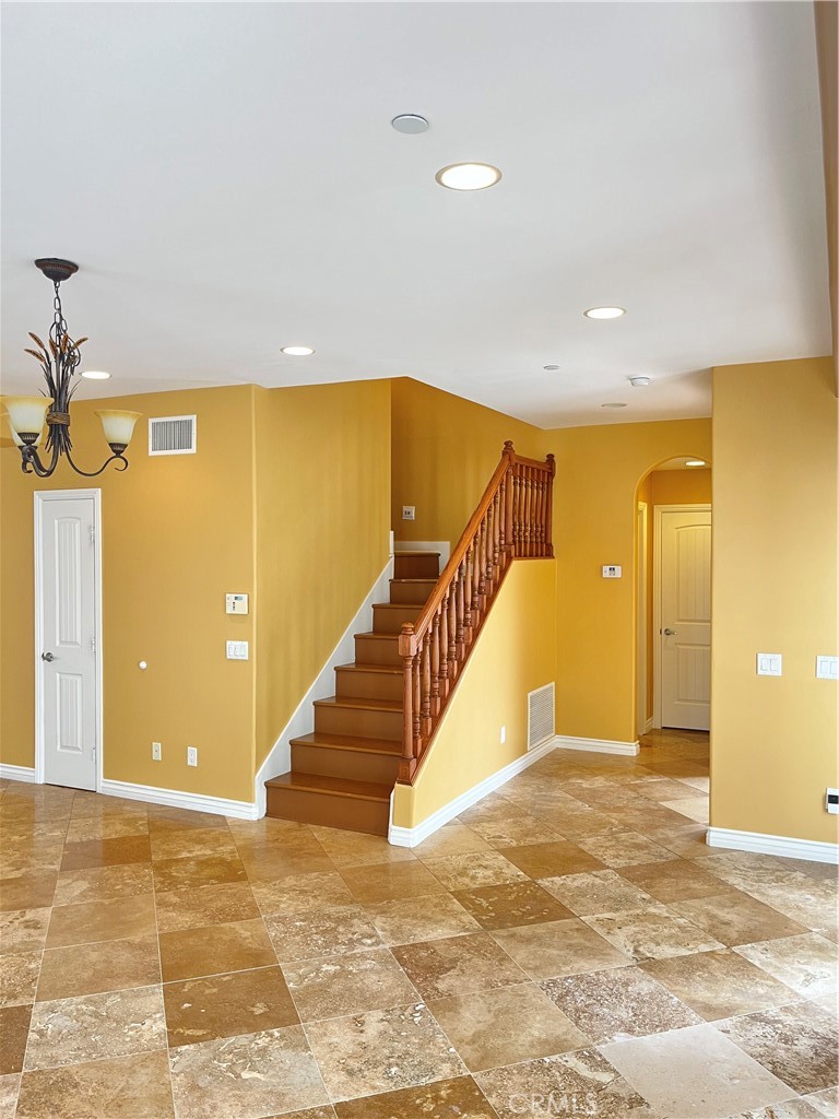244 Avenida Granada, Unit B San Clemente, CA 92672 - Photo 6 of 19 a view of a hallway with staircase