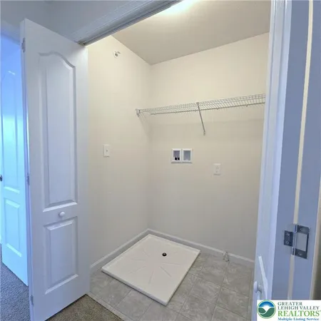a view of small space with racks on the wall