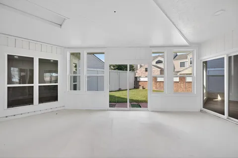 a front view of house with yard and outdoor seating