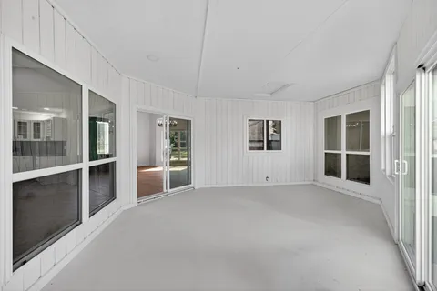 an aerial view of a house with a garden