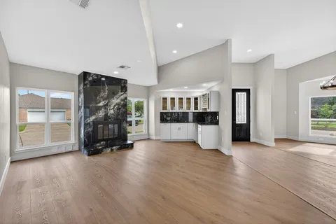 a kitchen with a sink and cabinets