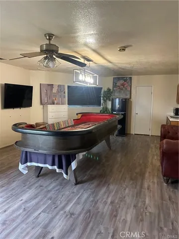 a room with furniture and flat screen tv