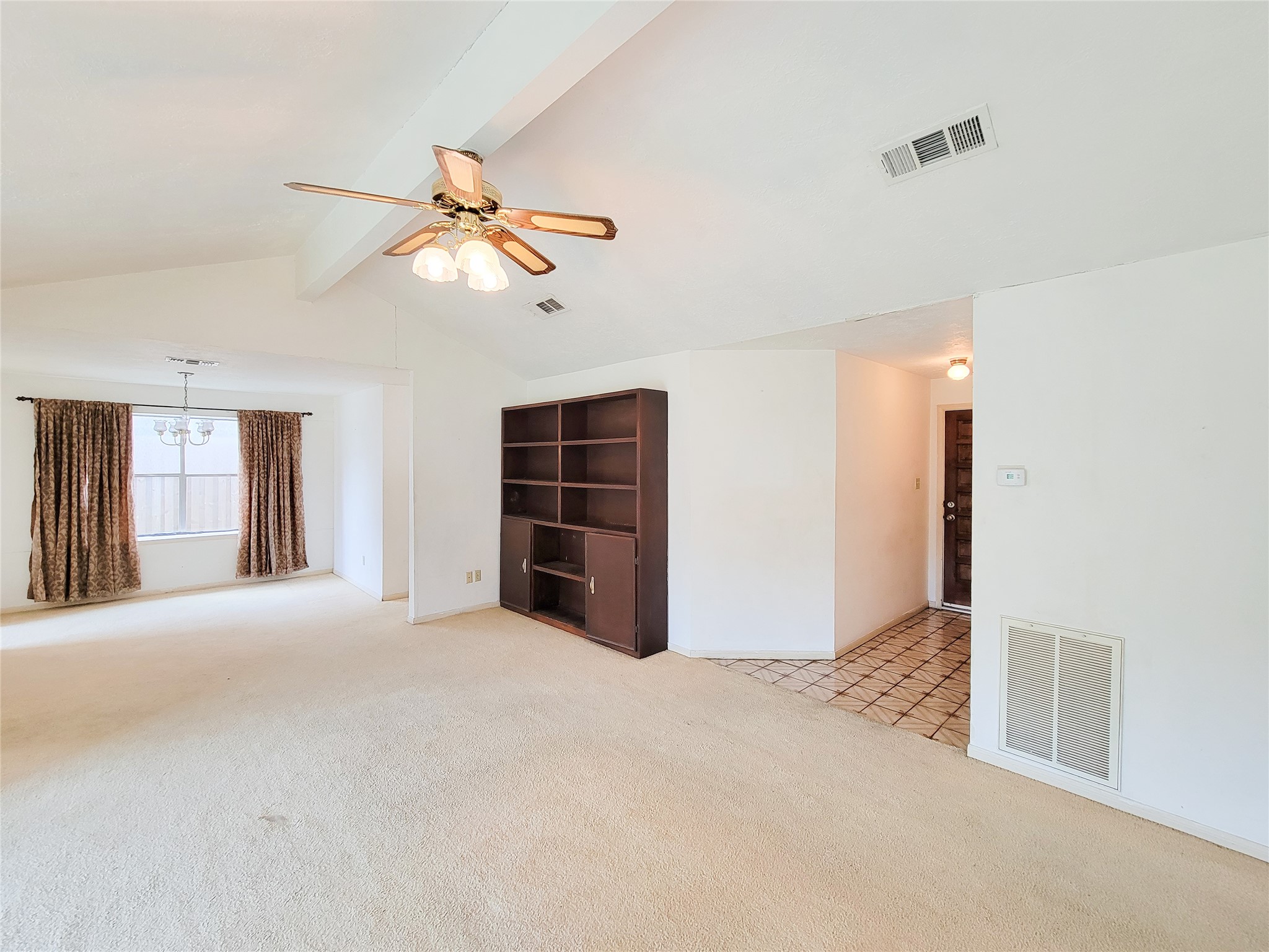 23211 Timberbrook Drive Spring, TX 77373 - Photo 9 of 34 a view of an empty room with a window