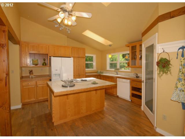 39604 Little Fall Creek Road Fall Creek, OR 97438 - Photo 4 of 8 a kitchen with a sink appliances cabinets and furniture