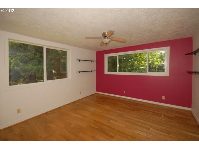 39604 Little Fall Creek Road Fall Creek, OR 97438 - Photo 5 of 8 a view of an empty room with a window