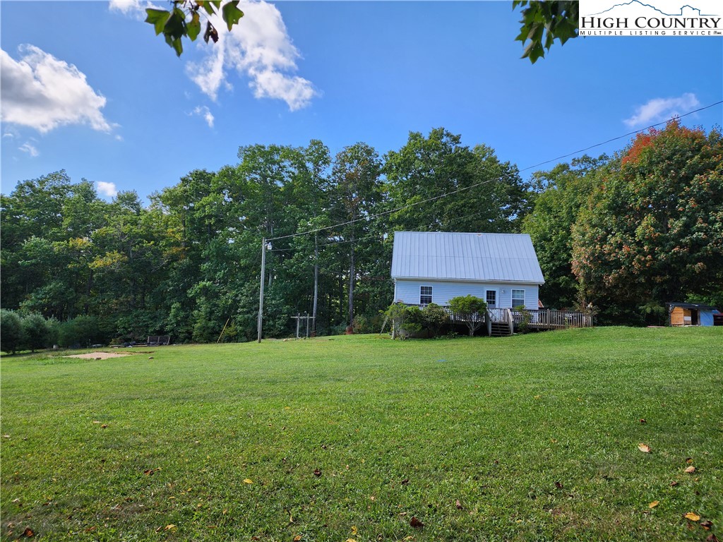 369 Ransey Woodring Road Todd, NC 28684 - Photo 3 of 6 a view of a trees with a big yard