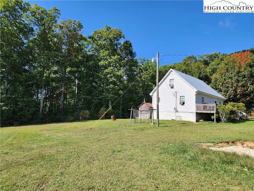 369 Ransey Woodring Road Todd, NC 28684 - Photo 6 of 6 a view of a house with a yard