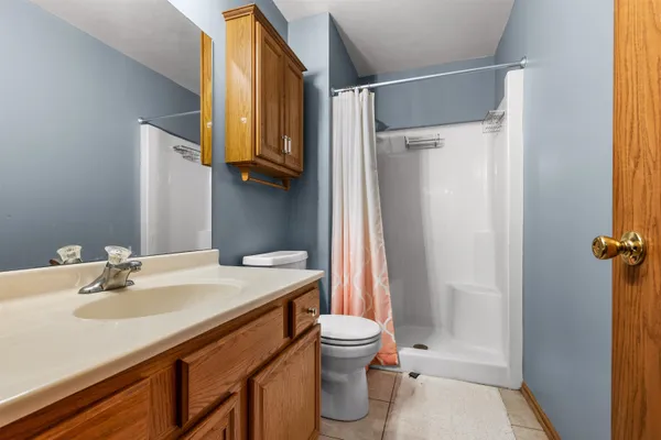 a utility room with sink dryer and washer