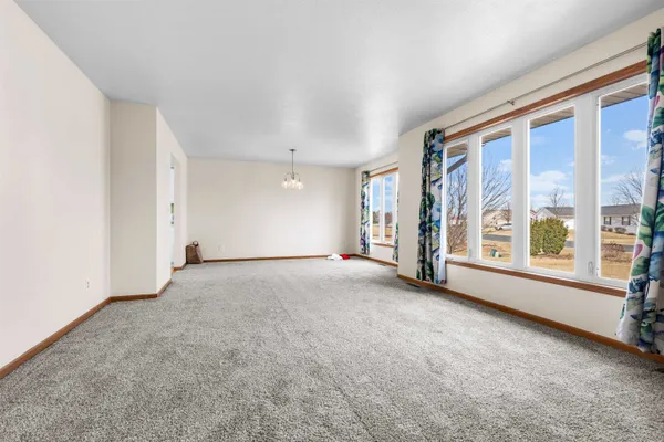 a kitchen with stainless steel appliances a refrigerator sink and cabinets