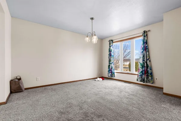 a kitchen with stainless steel appliances a stove a microwave and cabinets