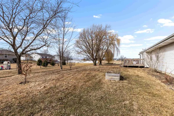 a backyard of a house with trees