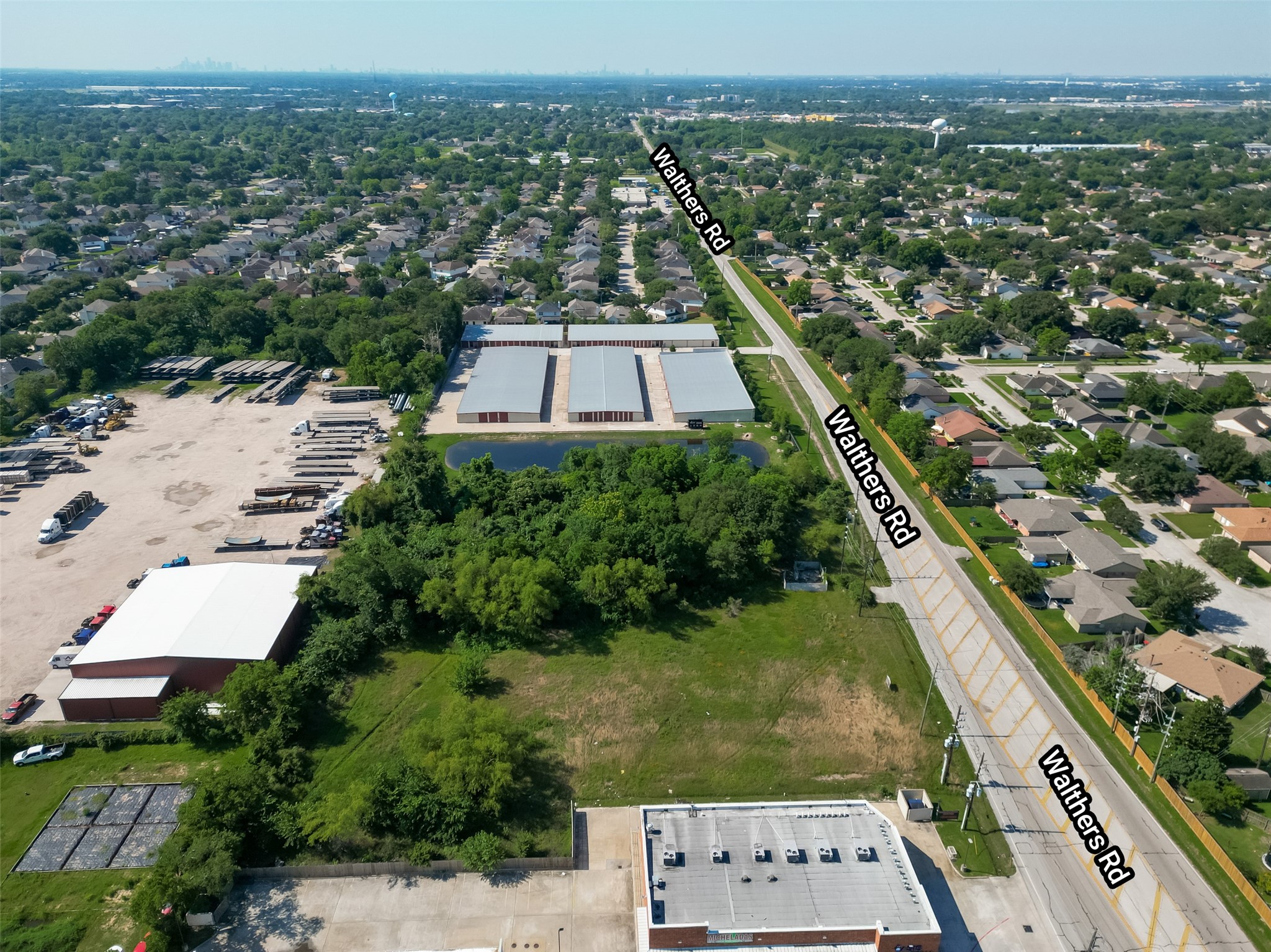 11966 Walters Road Houston, TX 77067 - Photo 5 of 23 an aerial view of residential houses with outdoor space