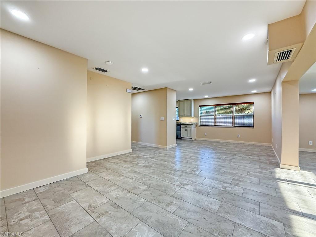 2115 St Croix Avenue Fort Myers, FL 33905 - Photo 8 of 37 Unfurnished living room with recessed lighting and baseboards