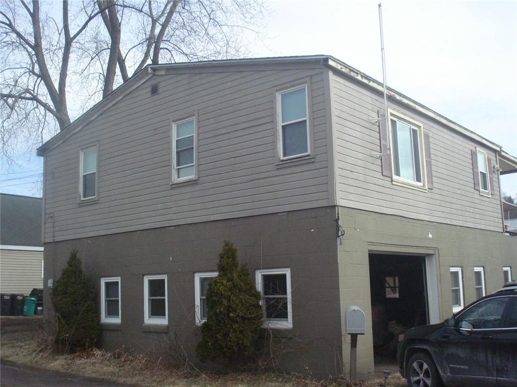 1119 Riverside Drive Beaver, PA 15009 - Photo 2 of 14 a front view of a house with a yard