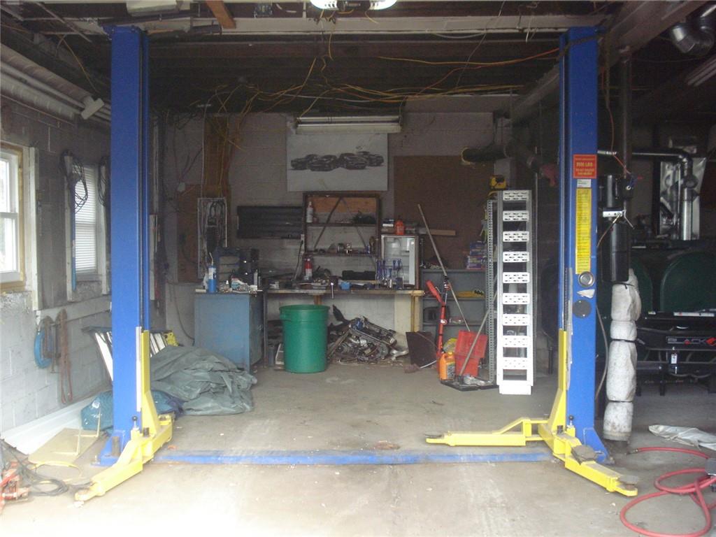 1119 Riverside Drive Beaver, PA 15009 - Photo 3 of 14 a room with water heater and a wooden floors