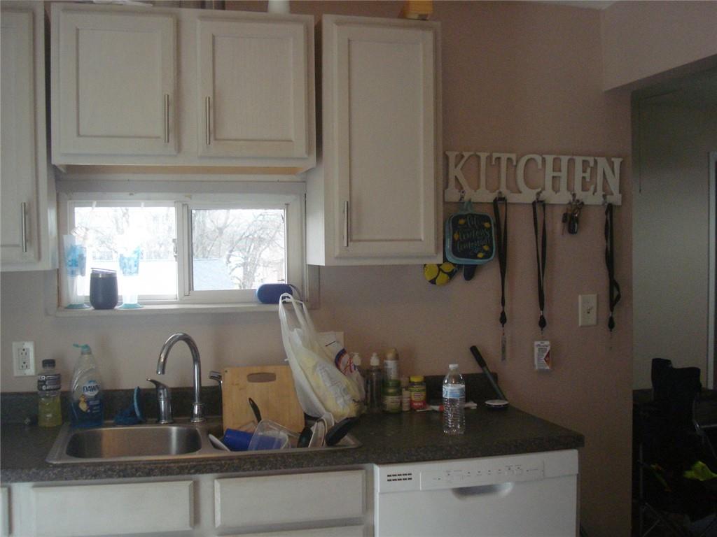 1119 Riverside Drive Beaver, PA 15009 - Photo 5 of 14 a kitchen with a sink and a window