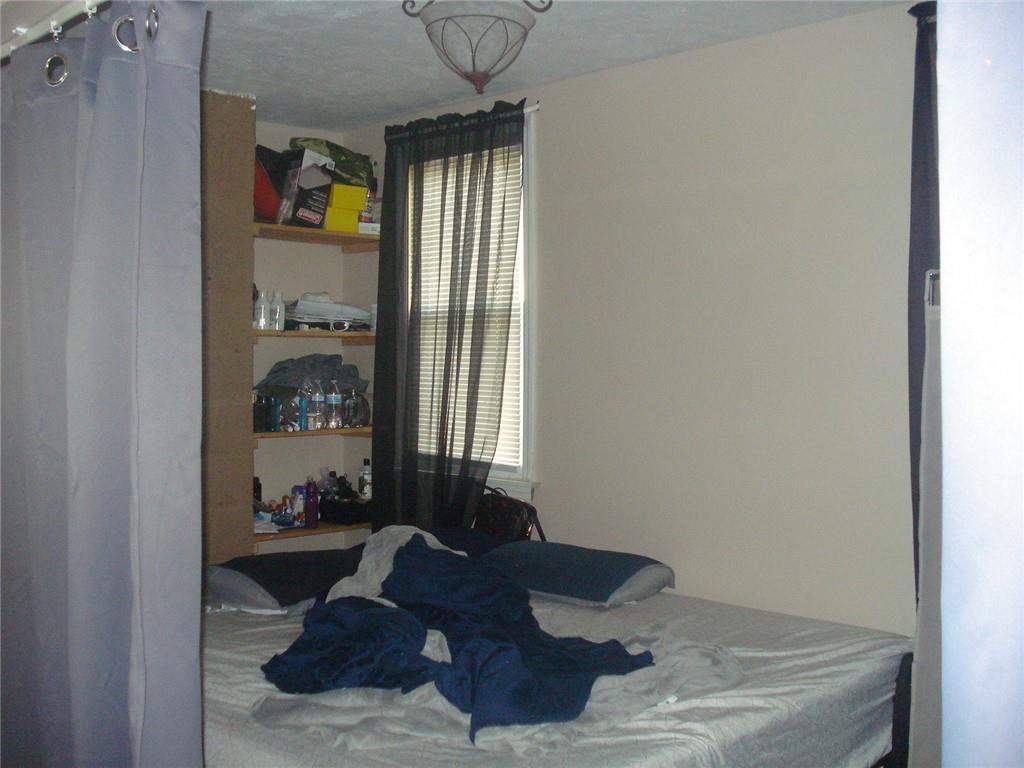 1119 Riverside Drive Beaver, PA 15009 - Photo 10 of 14 a living room with furniture and a window