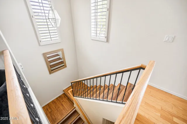 a view of a hallway with windows
