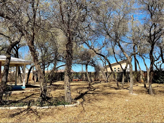 a view of a yard with snow