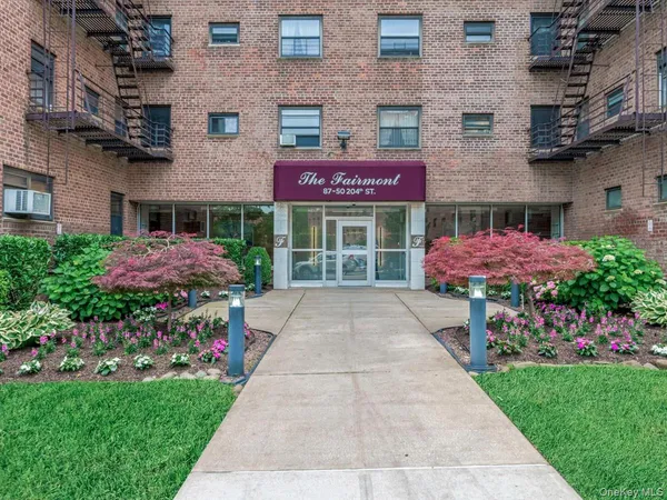 a front view of a building with an outdoor space