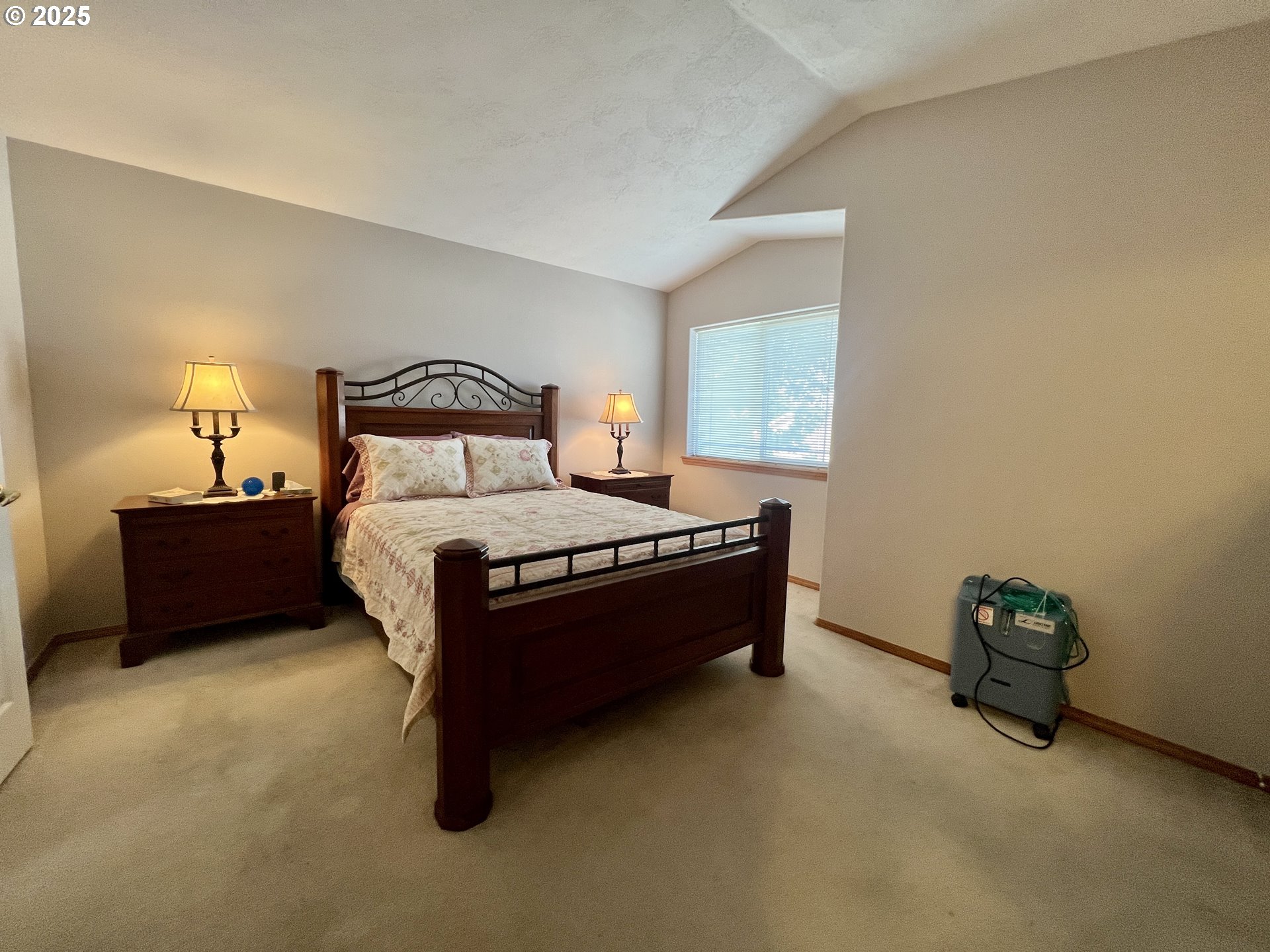 112 Northeast 11th Street Hermiston, OR 97838 - Photo 16 of 23 a bed room with a bed and a lamp