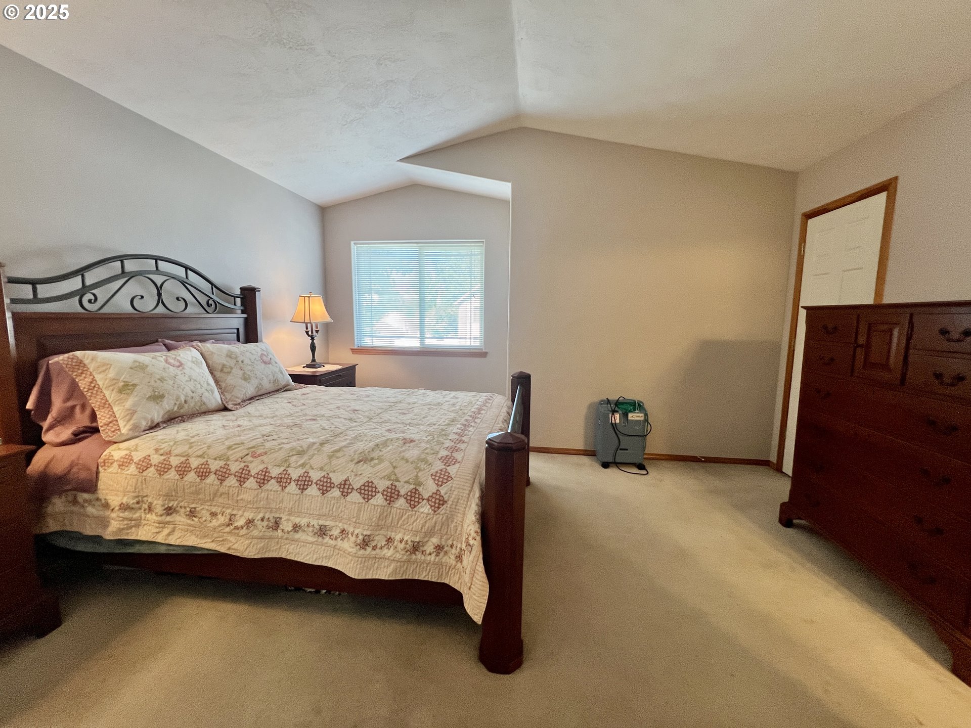 112 Northeast 11th Street Hermiston, OR 97838 - Photo 17 of 23 a bedroom with a bed and a window