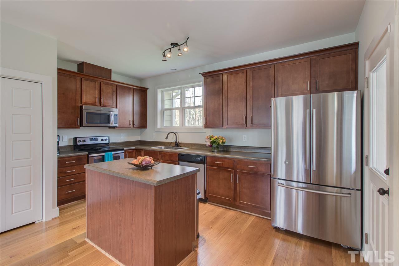 4 Moss Spring Court Durham, NC 27712 - Photo 8 of 25 Plenty of counter space and an island