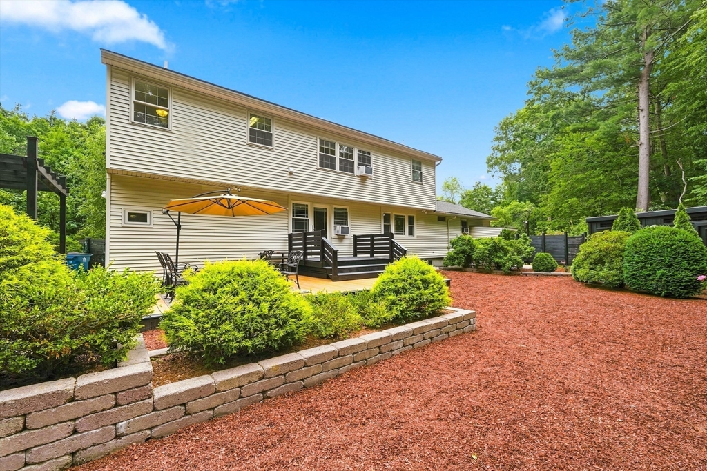 90 Rounsevell Road Tewksbury, MA 01876 - Photo 28 of 42 a front view of a house with a yard