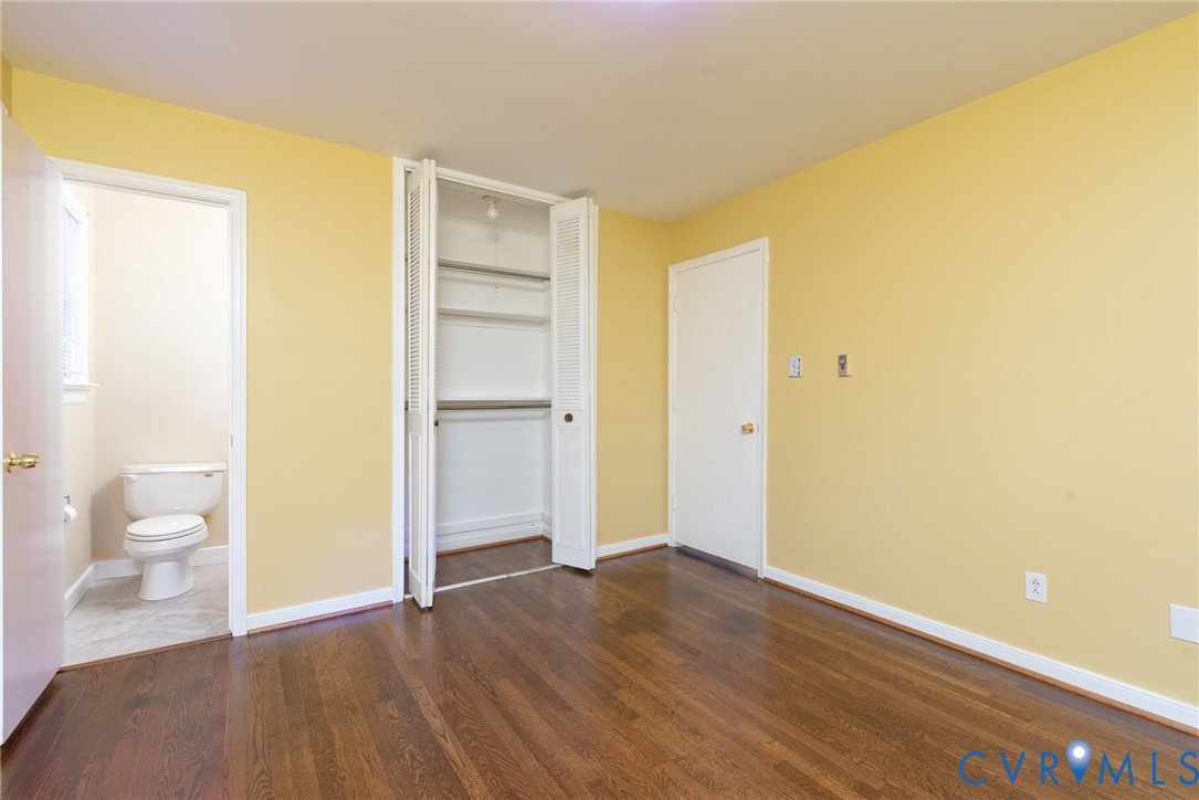 2016 Denton Drive Richmond, VA 23235 - Photo 15 of 39 a view of a room with wooden floor and a toilet
