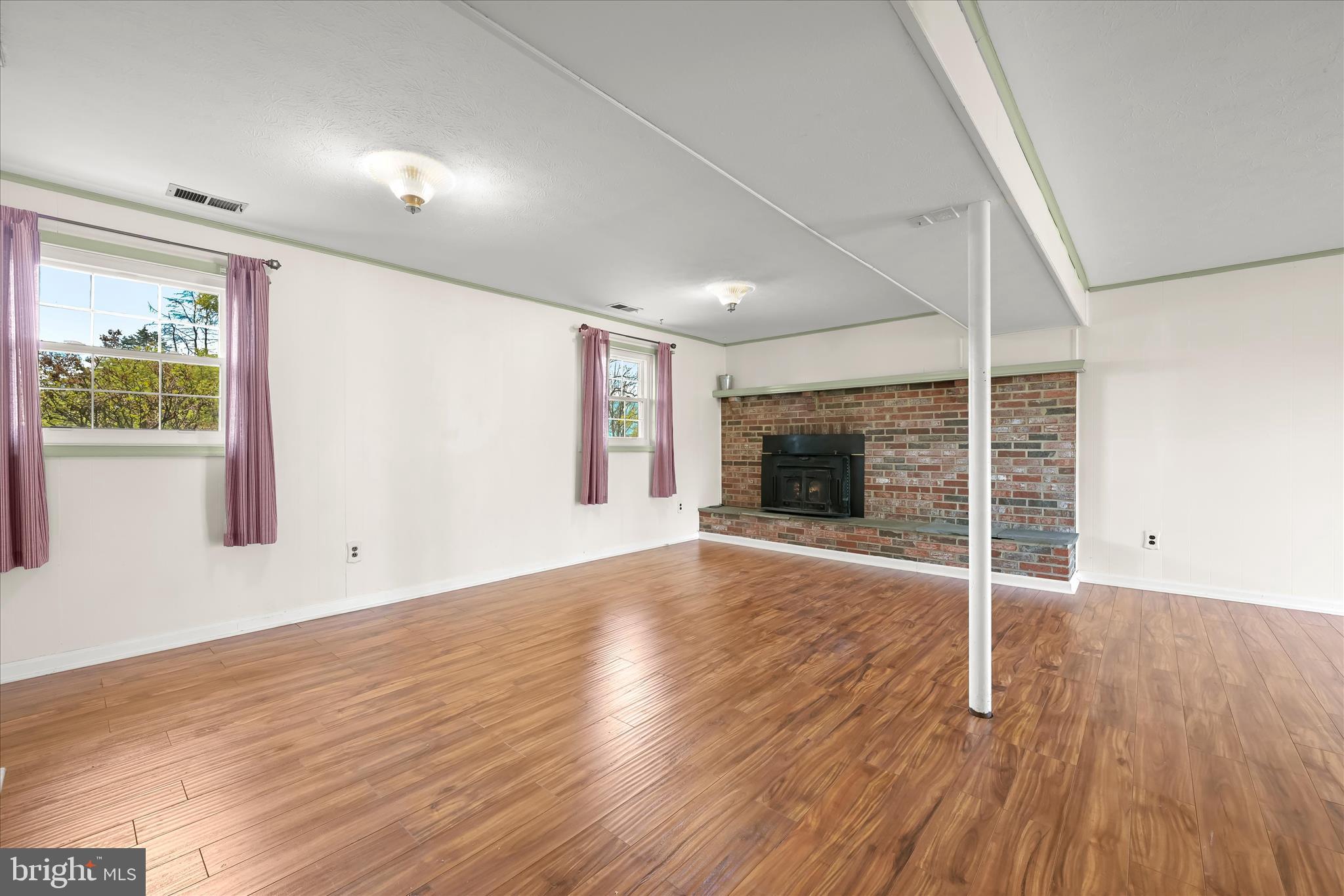 14821 Ridge Oak Drive Boyds, MD 20841 - Photo 33 of 50 family room with brick fireplace