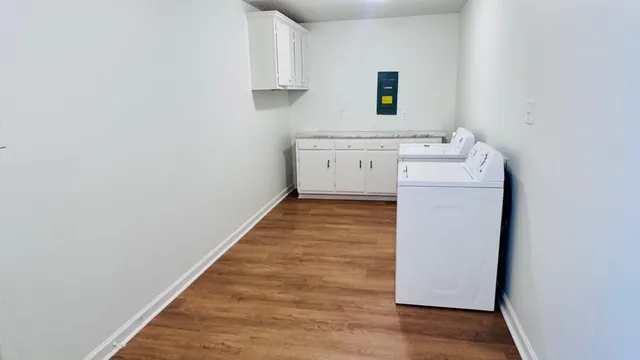 a utility room with dryer and washer