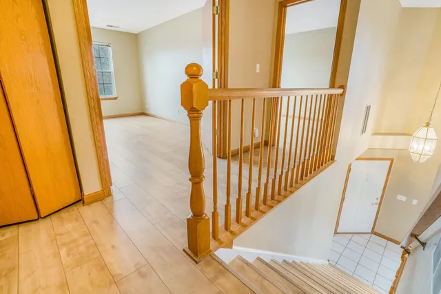 a view of entryway with wooden floor
