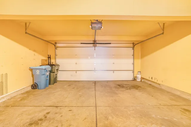 a view of a garage with wooden floor