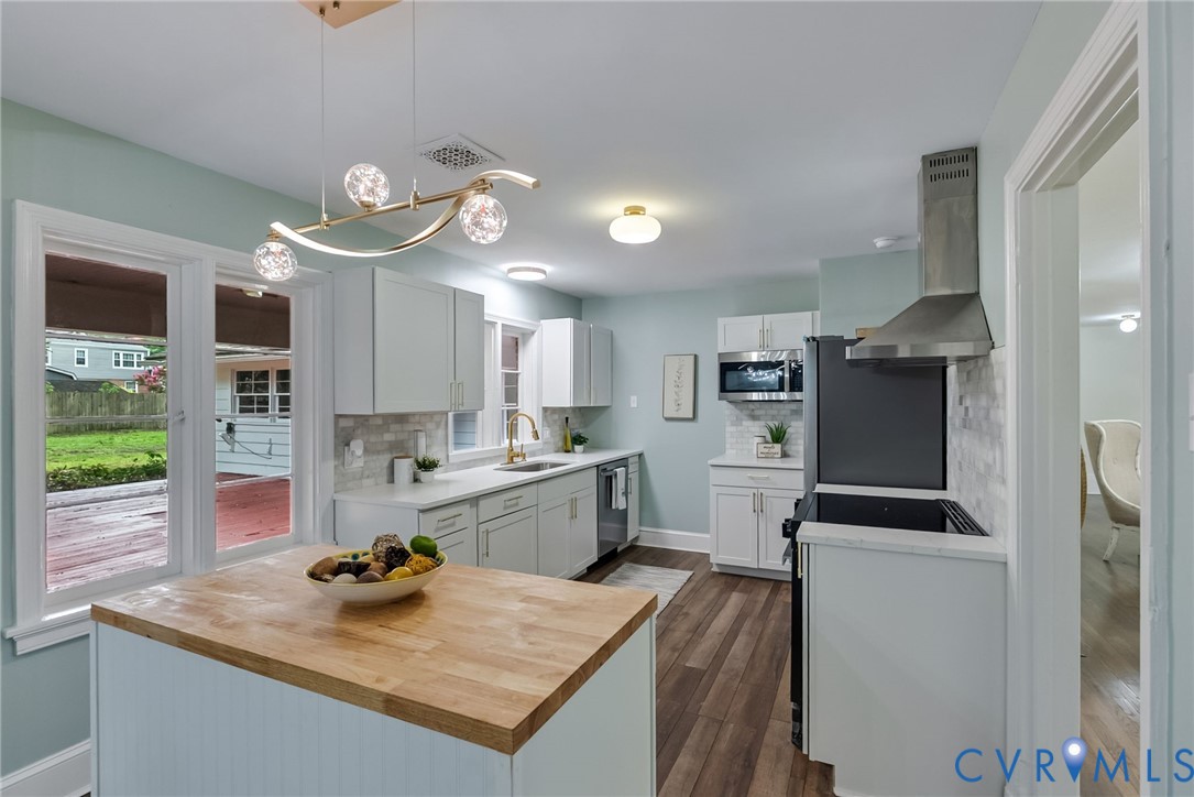 1136 Overbrook Road Petersburg, VA 23805 - Photo 20 of 51 Modern kitchen featuring a central island with a w