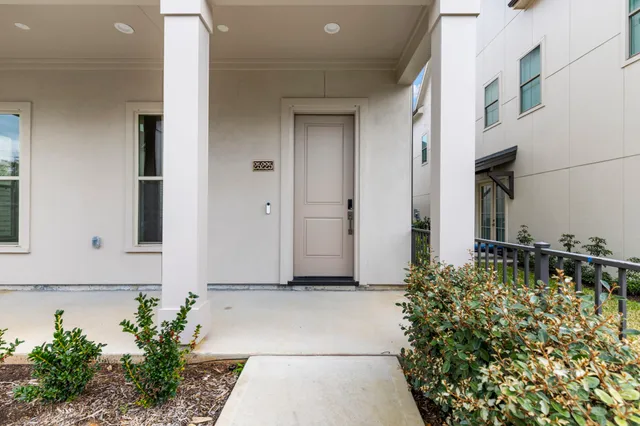 a view of a entryway with flower pots