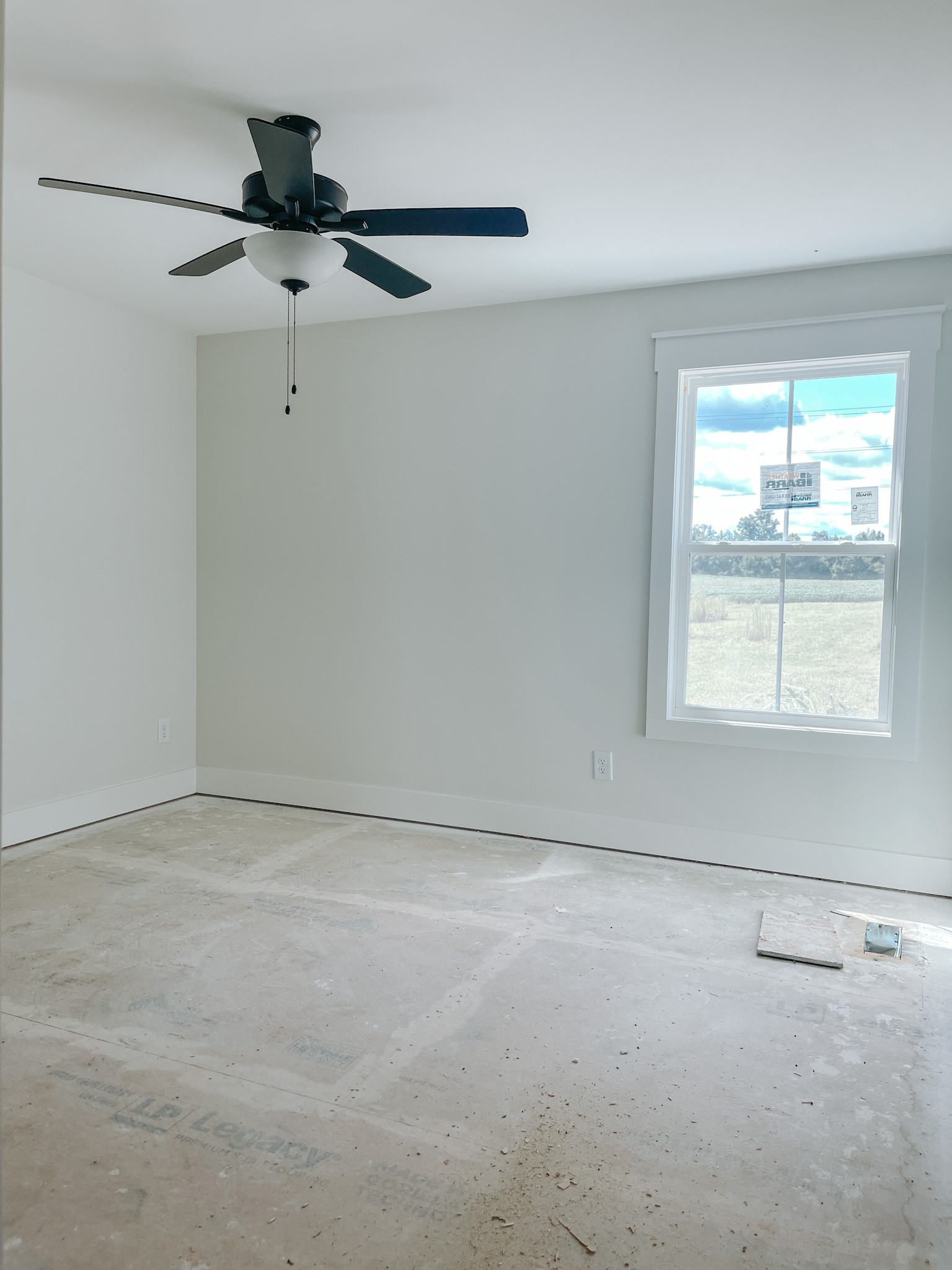247 Tom Ferrell Road Portland, TN 37148 - Photo 8 of 10 a view of an empty room with a window