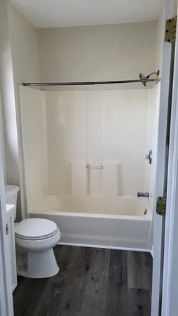 a bathroom with a toilet and a sink