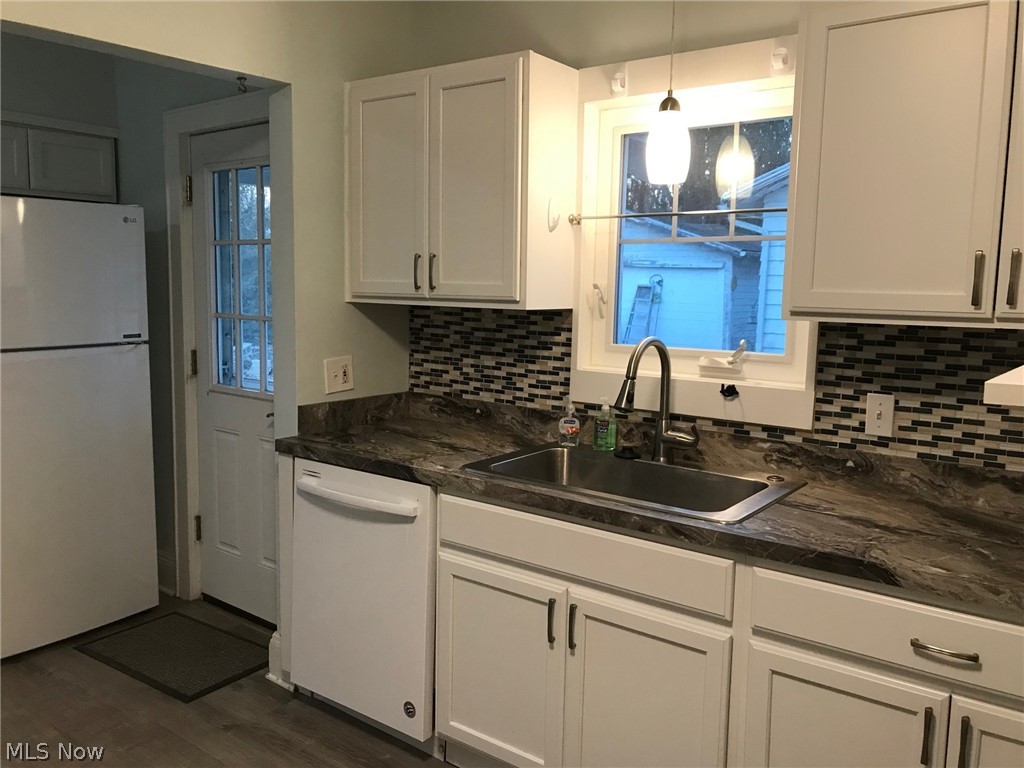 3352 Wadsworth Road Norton, OH 44203 - Photo 10 of 33 Newer cabinetry, countertops, backsplash, sink, fixtures