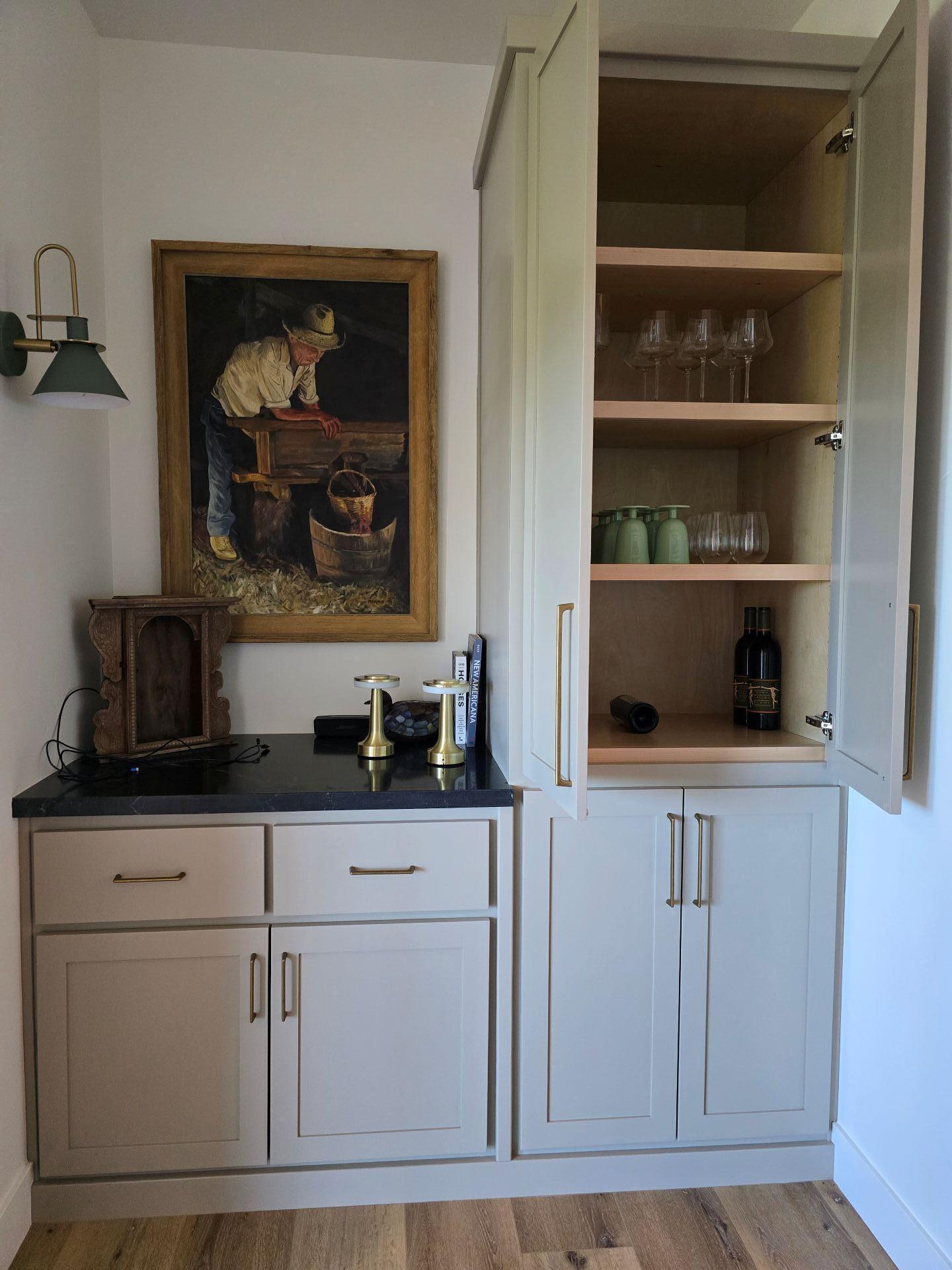 240 Rockinghorse Bend Road Payson, AZ 85541 - Photo 10 of 53 a kitchen with white cabinets and a stove with wooden floor
