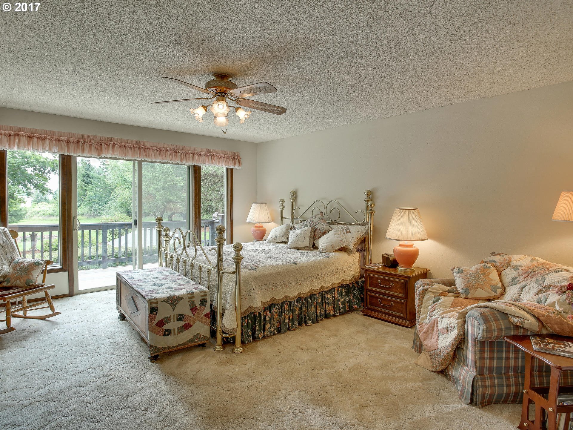 22374 Southeast Ridgeview Drive Damascus, OR 97089 - Photo 24 of 32 a bedroom with bed and a large window