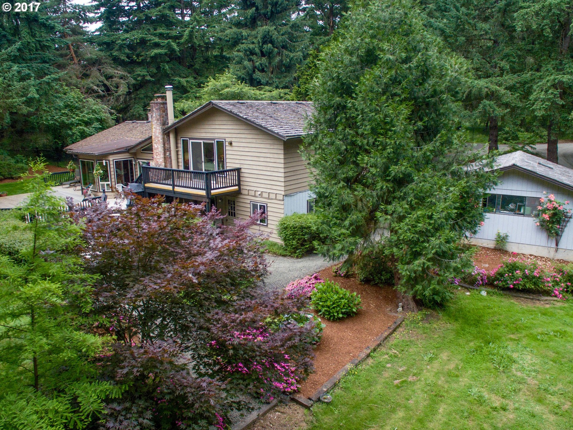 22374 Southeast Ridgeview Drive Damascus, OR 97089 - Photo 5 of 32 a aerial view of a house and garden
